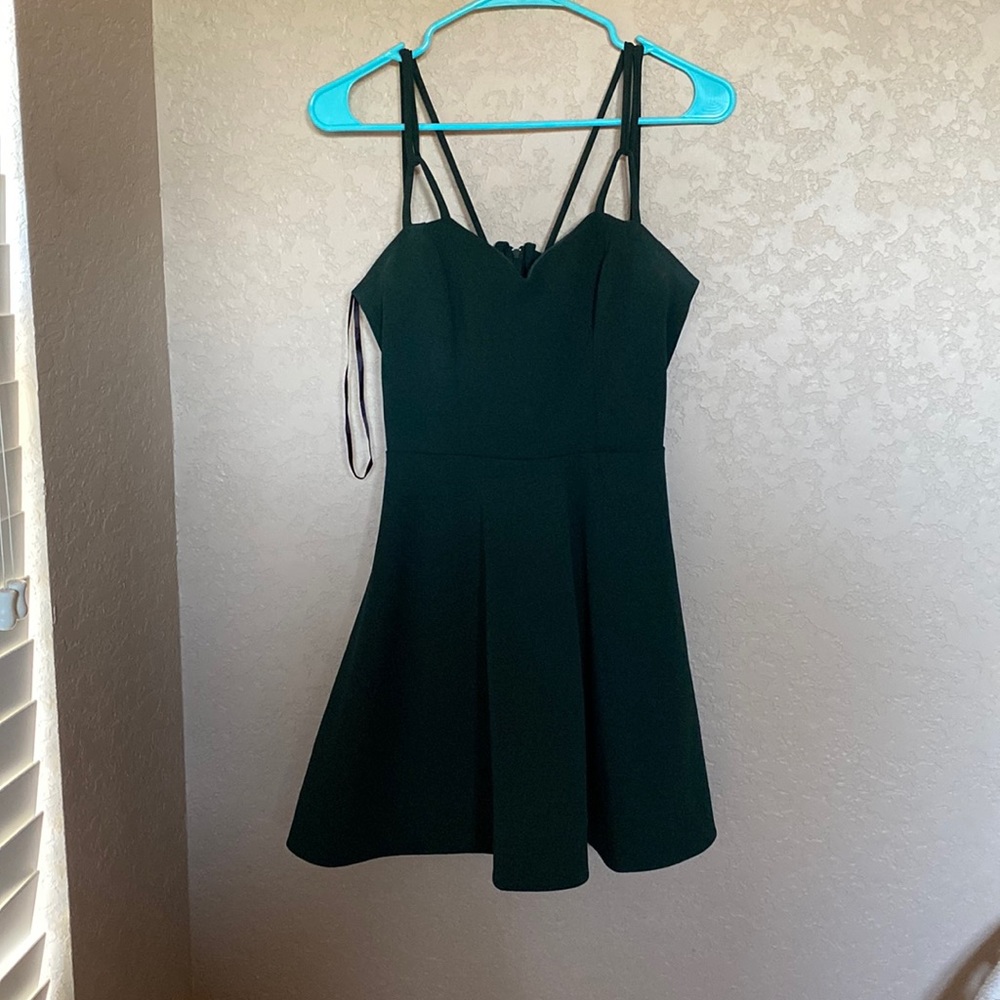 This dress was worn once, it has a built in bra and is perfect for anything!